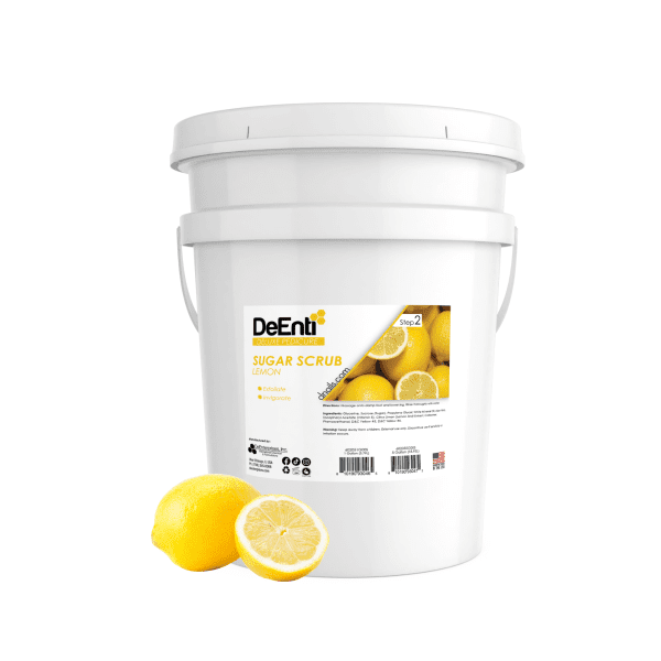 A 5-gallon bulk pail of DeEnti Lemon Sugar Scrub for professional deluxe pedicures, shown with a fresh whole and sliced lemon.